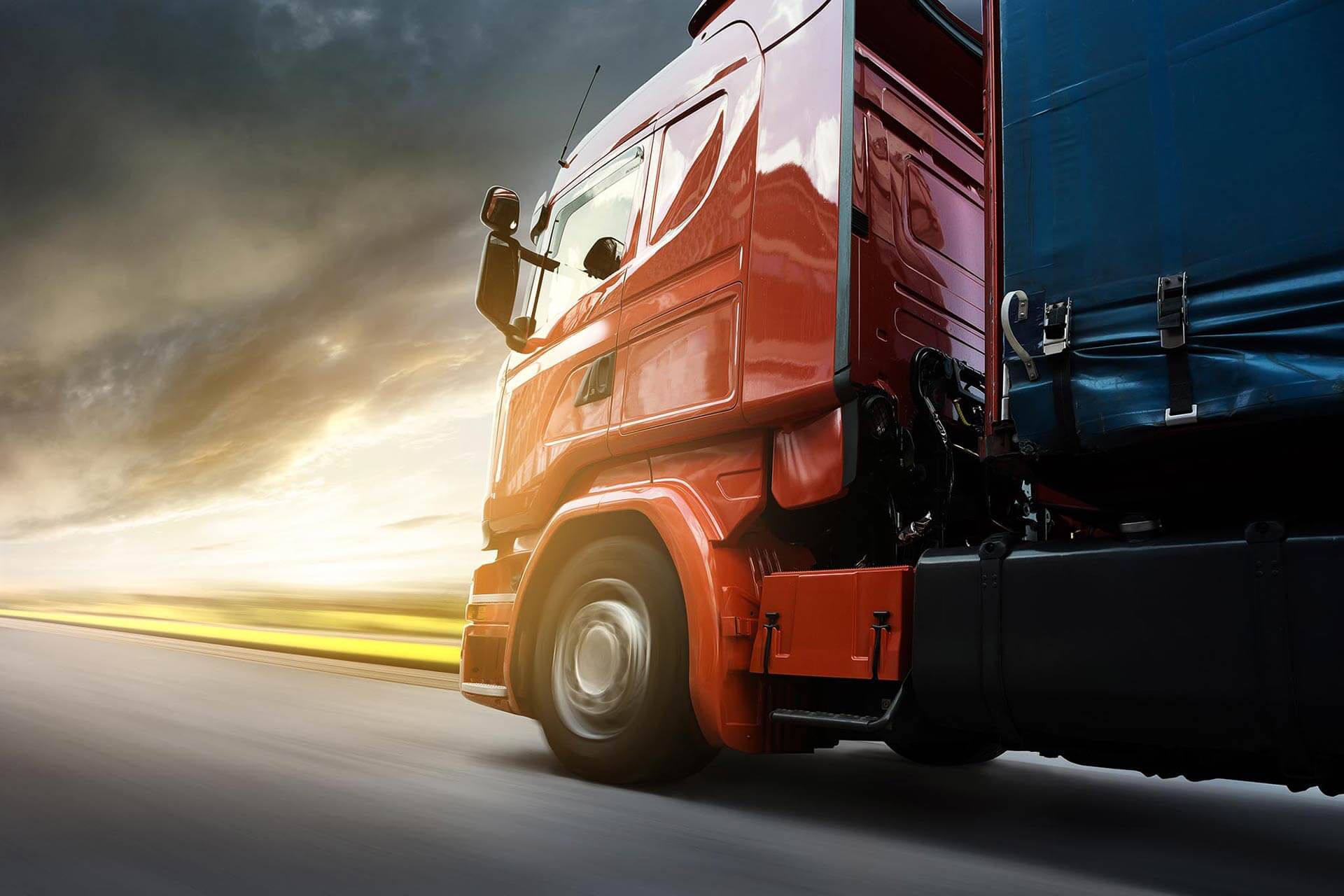 Auto-Stop Logistics Hub – Advanced Fleet & Warehousing Auto-Stop trucks loading and unloading at our modern Romanian logistics center, part of our 50+ vehicle European fleet.